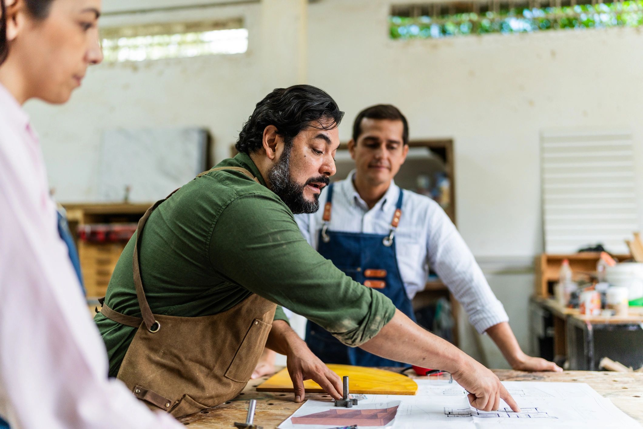 Local artisans collaborating in a workshop
