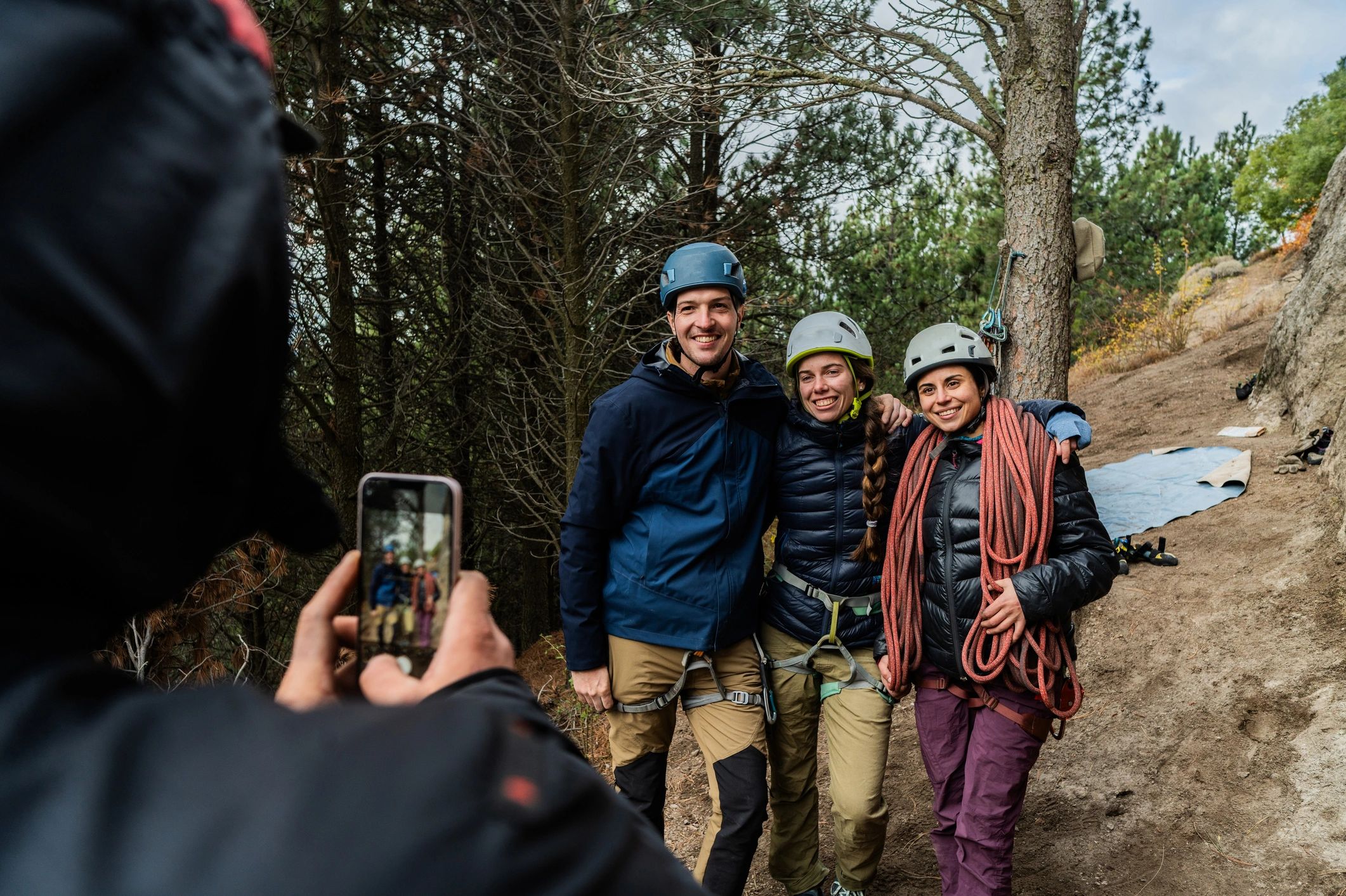 Group of friends preparing for outdoor climbing